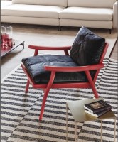 Fast armchair with red lacquered frame